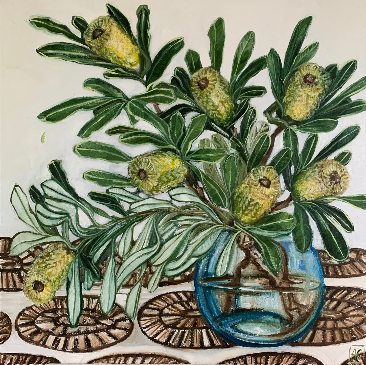 Banksia in blue glass