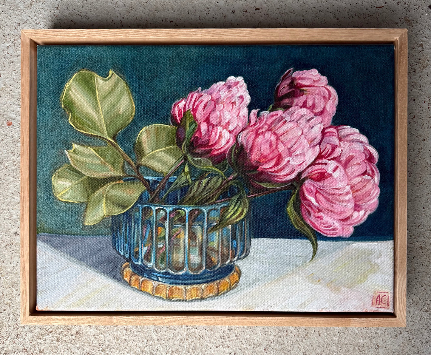 Peonies and dollar gum in glass